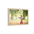 Framed Matte Canvas Photo Print — Autumn Child Playing in Leaves