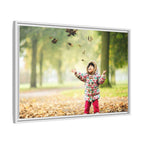 Framed Matte Canvas Photo Print — Autumn Child Playing in Leaves